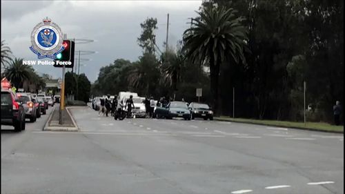 The Finks bikies blocked off the car's escape with their bikes. Picture: NSW Police