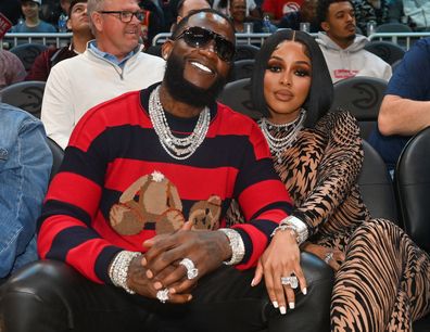 ATLANTA, GEORGIA - MARCH 26: Rapper Gucci Mane and Keyshia Ka'Oir attend the game between the Memphis Grizzles and the Atlanta Hawks at State Farm Arena on March 26, 2023 in Atlanta, Georgia. (Photo by Paras Griffin/Getty Images)