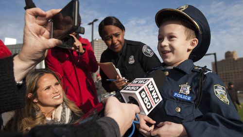 Boy who donated Christmas money to K-9 unit made police chief for a day