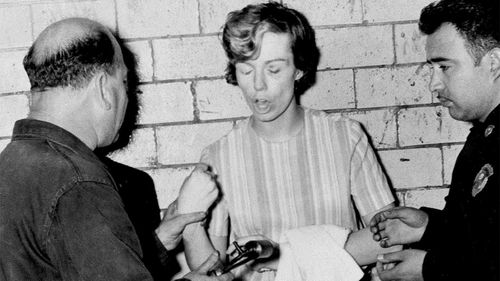 Sharon Kinne refusing Mexican police efforts to take her fingerprints.