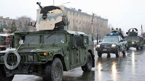 Afghan security forces arrive at the Kabul military academy after it was attacked earlier today. (Photo: AP).