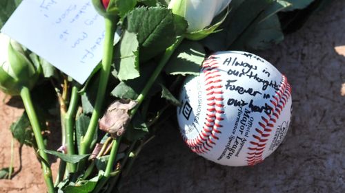 A 2013 photo of a tribute to Chris Lane on the home plate at Essendon Baseball Club in Melbourne. (AAP)
