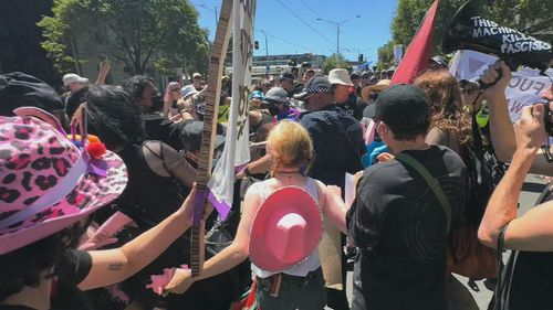 Victoria Police said they were "confronted" by "up to 50" protesters soon after the march started.﻿