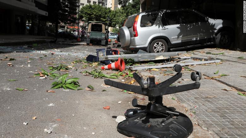 Shattered glass and debris are seen after gunfire erupted.