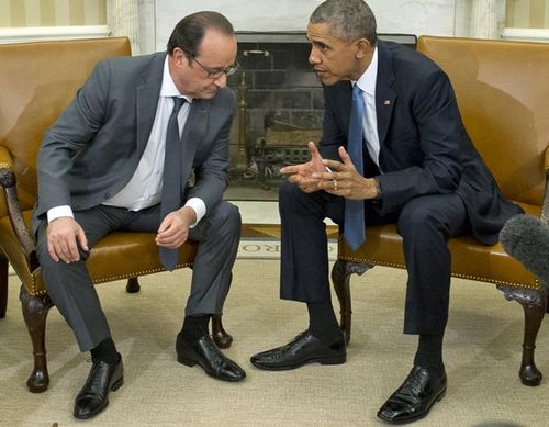 French President Francois Hollande (left) met with US President Barack Obama at the White House overnight. (Getty)