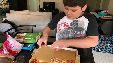 Giovanni with autism making lasagne