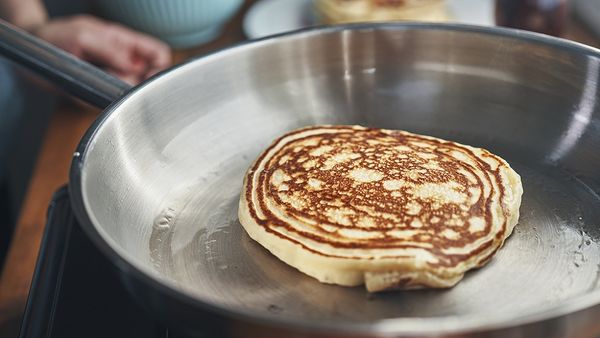 Shrove Tuesday cooking pancakes
