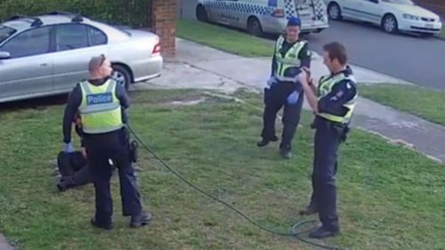 Three police officers have been charged over the incident.