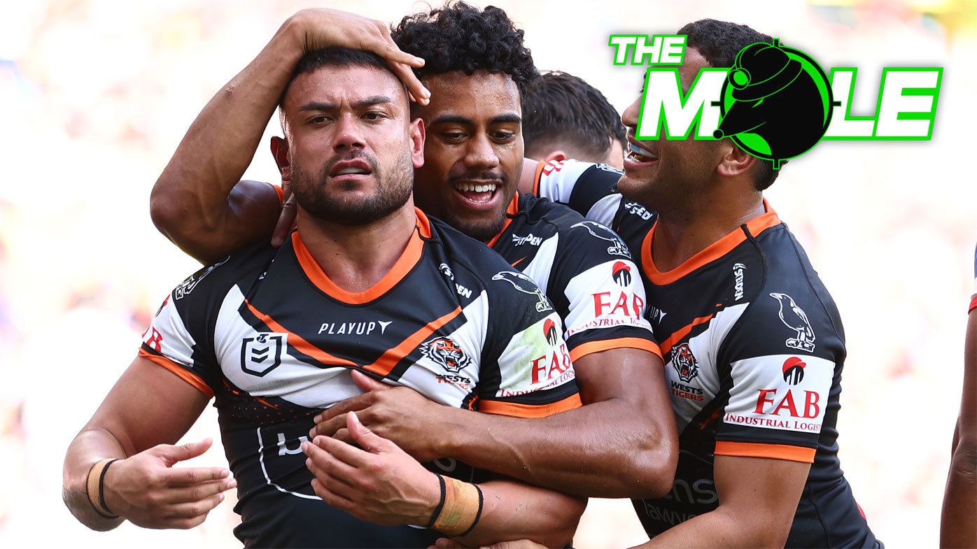 Wests Tigers celebrate a David Nofoaluma try against the Dragons.