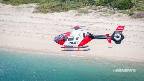The helicopter's 44-year-old pilot is missing. (9NEWS)