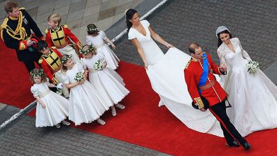 HRH Prince William, Duke of Cambridge and Catherine, Duchess of Cambridge, are followed by Maid of Honor Pippa Middleton, her pages and bridesmaids, and her best man Prince Harry as they prepare to begin their journey with a carriage procession to Buckingham Palace in Marriage Westminster Abbey on April 29, 2011 in London, England.  The marriage of the second in line to the British throne was led by the Archbishop of Canterbury