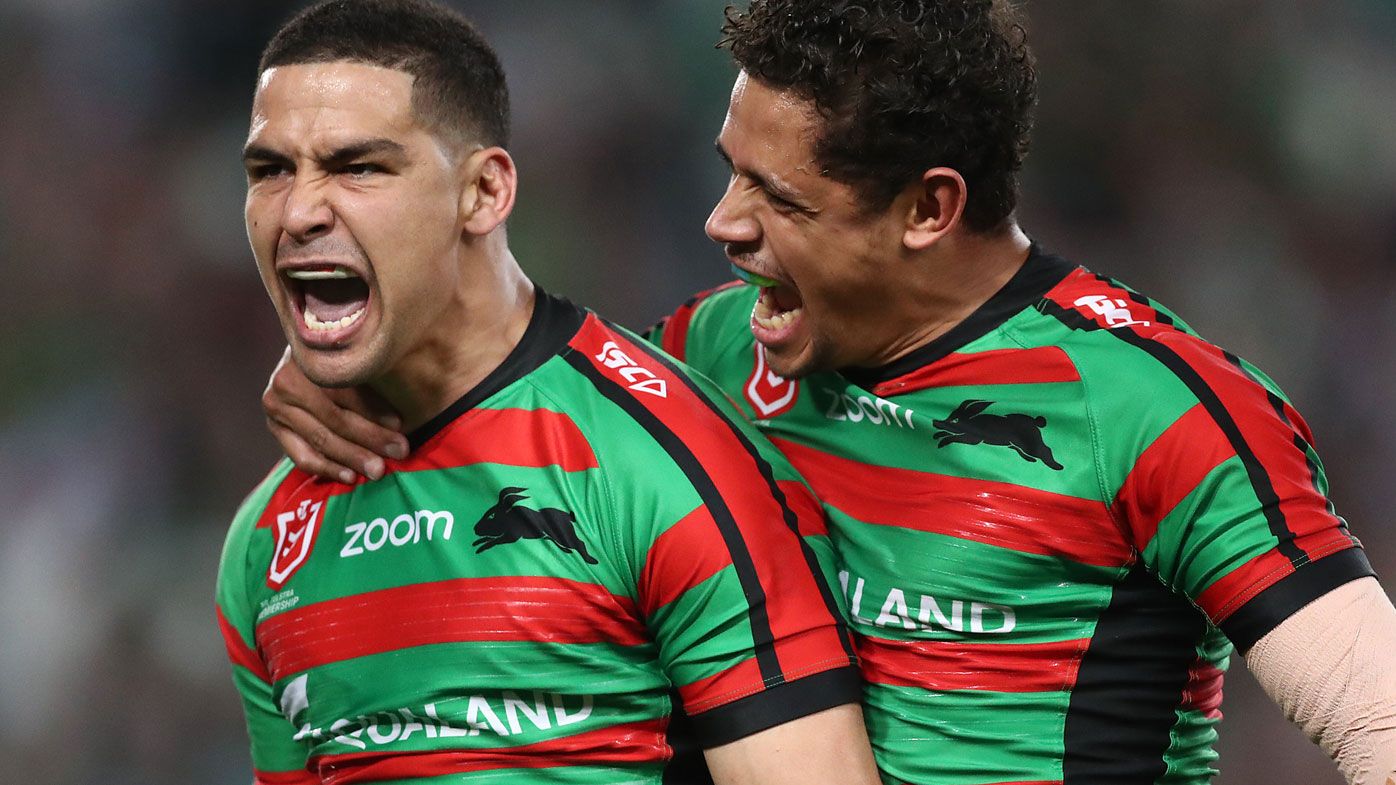Cody Walker of the Rabbitohs celebrates scoring a try 