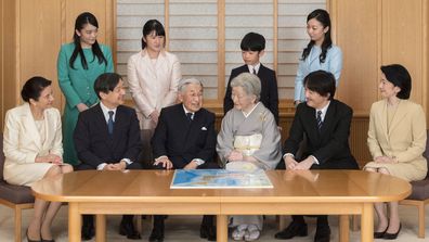 Imperial family members in this photo are, front left, to right, Crown Princess Masako, Crown Prince Naruhito, Emperor Akihito, Empress Michiko, Prince Akishino, and Princess Kiko, and, back from left to right, Princess Mako, Princess Aiko, Prince Hisahito, and Princess Kako