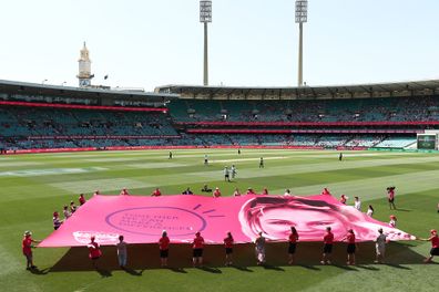 A giant pink banner is unfurled on Jane McGrath Day in 2019 in Sydney, Australia. 