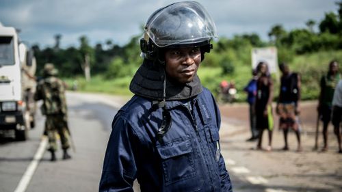 A security guard at the check point near the Kenema eastern province of Sierra Leone. (Getty Images)