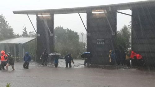 Flooding at the Milford Sound Visitor Terminal on Monday. More than 380 people are trapped at Milford Sound because of the weather.