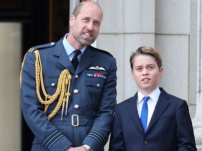Prince William, Prince of Wales and Prince George of Wales during the fly-past on Buckingham Palace balcony to mark the 80th anniversary of VE Day on May 05, 2025 in London, England. 