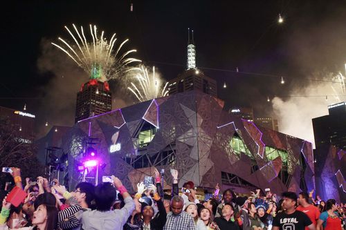 Thousands ring in 2017 in Federation Square. (AAP)
