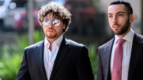 Daniel Taylor (left) arrives at the Central Local Court in Sydney. (AAP)