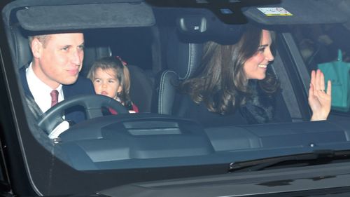 The Duke and Duchess and Cambridge with Princess Charlotte arrive at Buckingham Palace. (Philip Toscano/PA via AP)