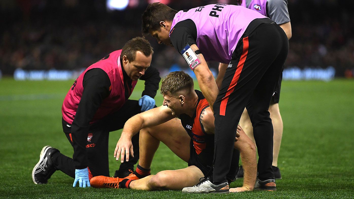 Essendon star Jake Stringer cleared of serious leg injury after limping off against Hawthorn