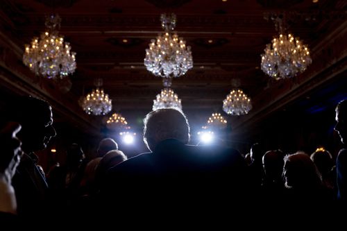 FILE - Former President Donald Trump greets guests at Mar-a-lago on Election Day, Tuesday, Nov. 8, 2022, in Palm Beach, Fla. The Justice Department and lawyers for Donald Trump are at odds over whether the former president can assert executive privilege over documents seized from his Florida estate to shield them from investigators and over whether he can treat the records as his own personal belongings. (AP Photo/Andrew Harnik, File)