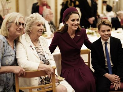 Catherine, Princess of Wales and Prince George join Second World War veterans at a tea party in Buckingham Palace following the military procession to mark the 80th anniversary of VE Day on May 5, 2025 in London, England. 