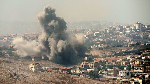 Smoke rises from Israeli airstrikes in the southern village of Kfar Rouman, seen from Marjayoun in south Lebanon on Wednesday, September 25.