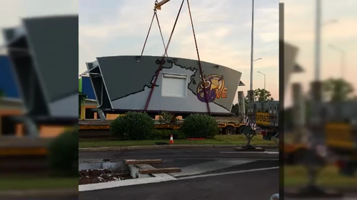 The couple recruited a group of tradies to simply lift the building out of the ground.