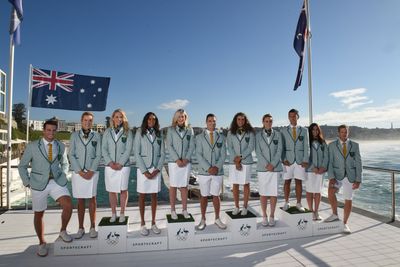 The uniforms, which the team will wear during the opening ceremony in Rio, features a green and white striped jacket with white bottoms and shoes.