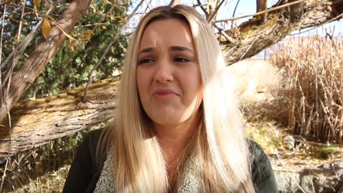 YouTuber Brooke Amelia Peterson in tears, claiming her father lost his job as an Apple engineer after she recorded a short video showing off the device's design. (YouTube)