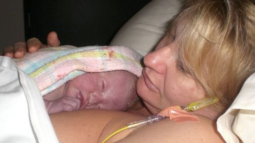 Sonja Jamsek holds her newborn daughter, Summer. (Supplied)