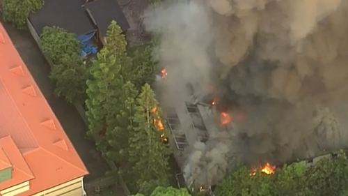 Fire has engulfed two buildings on Vulture Street in Brisbane's south.