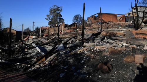 Questions are being asked of Rural Fire Service officers today who rejected extra help as a bushfire tore through the NSW town of Tathra on Sunday. Picture: AAP.
