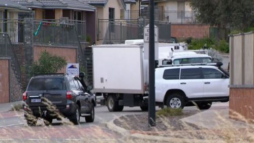 Heavily armed tactical police in Perth are negotiating with a man in an Ellenbrook home who is threatening to detonate explosive devices.