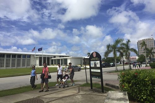People walk around Hagatna, Guam. (AAP)