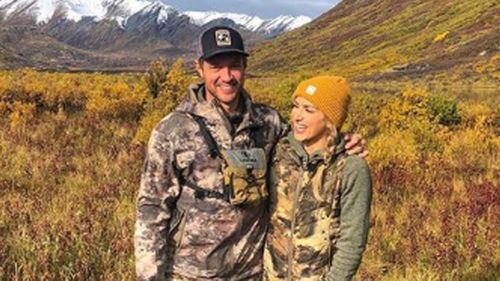 Brent with his wife, who also hunts.