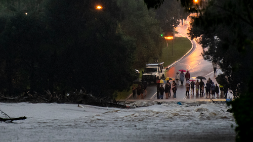 Heavy rain and floodwater is causing the Hawkesbury River at North Richmond Bridge to breach its banks and cut many roads.