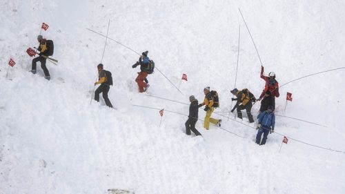 Rescuers managed to retrieve skiers buried in snow while others managed to free themselves.
