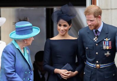 Queen Elizabeth with The Duke and Duchess of Sussex.