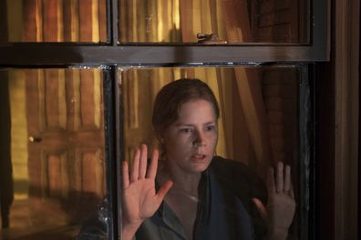 Still from 'The Woman in the Window' film with Amy Adams 2021.
