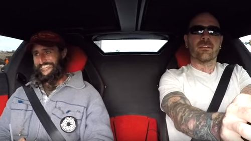 Alex can't hold back a grin as Chris Collins squeezes the gas pedal in the Lamborghini Aventador during the pair's original joyride. Source: YouTube