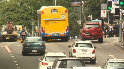 Brisbane commuters are spending longer behind the wheel as average speeds plummet on the city's roads. 