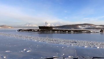 In this photo taken from video distributed by Russian Defense Ministry Press Service, the Vladimir Monomakh nuclear submarine of the Russian navy is seen before a practice missile launch in the Sea of Okhotsk, Russia, Saturday, December 12, 2020. 