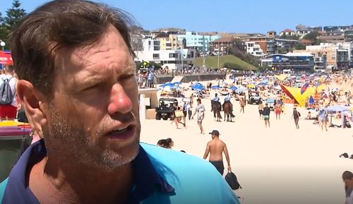 Lifeguards including Bruce Hopkins from Bondi Beach urged people to swim between the flags as the heatwave continues to build.

