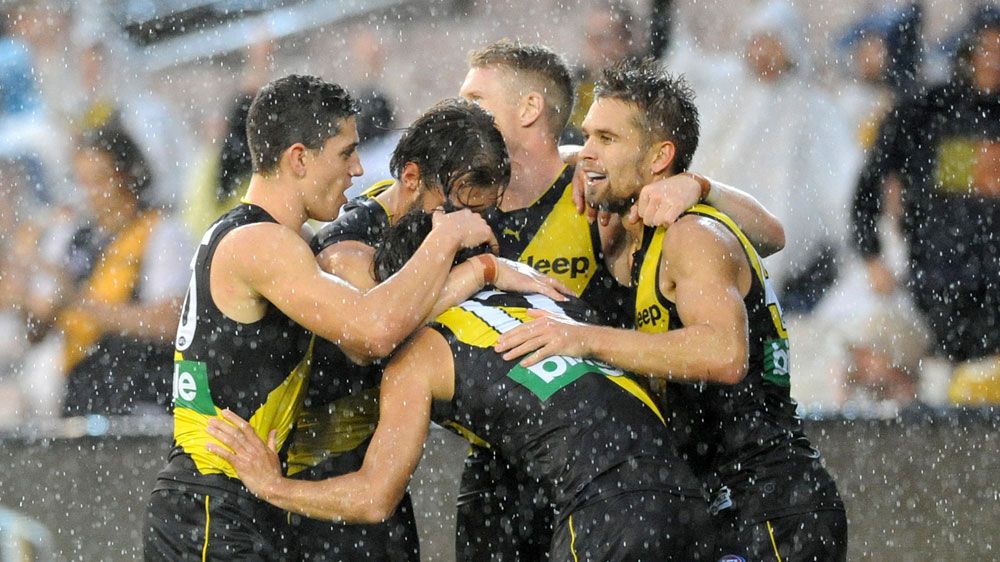 Richmond Tigers prevail over West Coast Eagles at stormy MCG