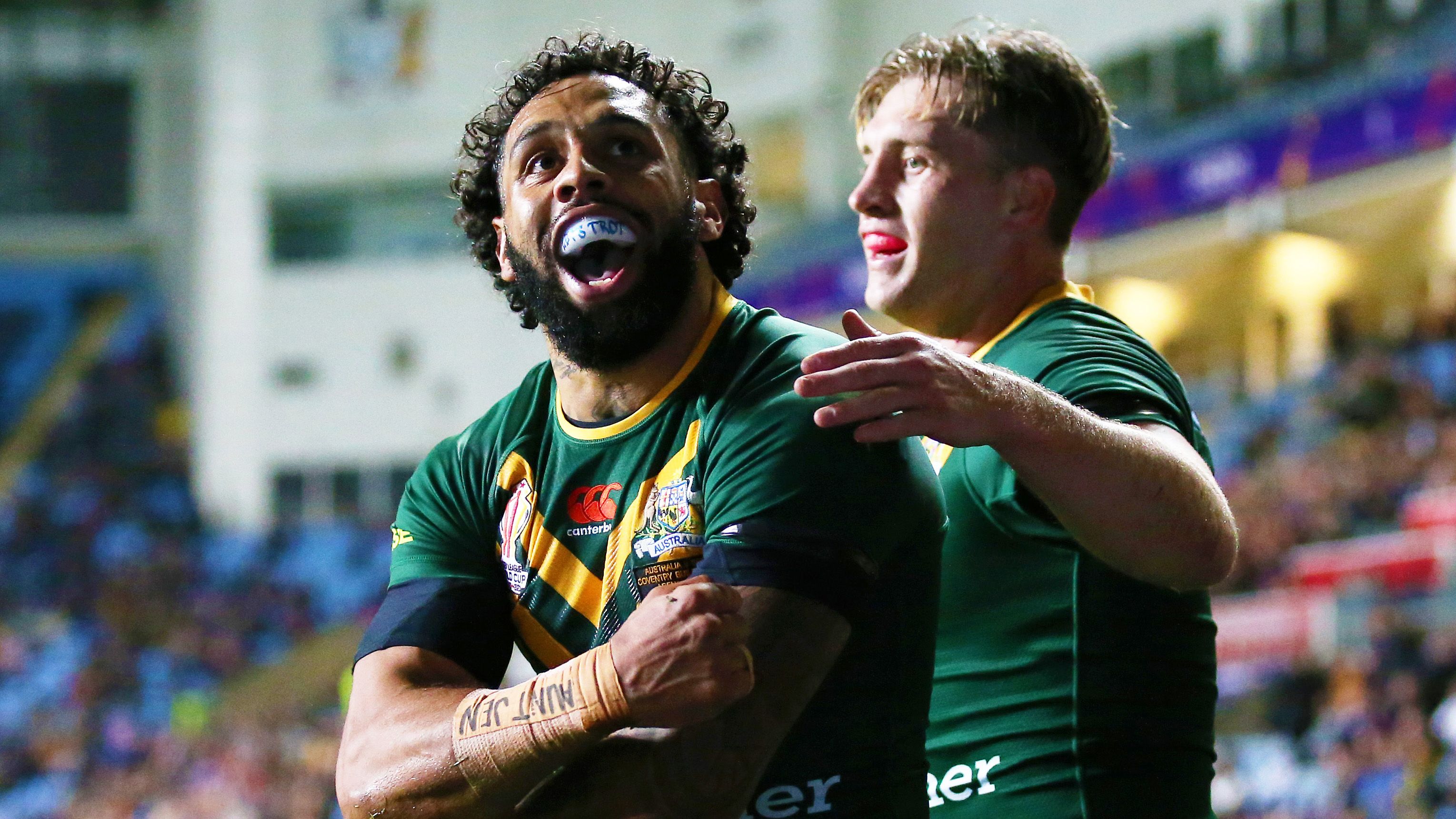 Josh Addo-Carr of Australia celebrates their sides sixth try with team mates during the Rugby League World Cup 2021 Pool B match between Australia and Scotland at The Coventry Building Society Arena on October 21, 2022 in Coventry, England. (Photo by Alex Livesey/Getty Images for RLWC)