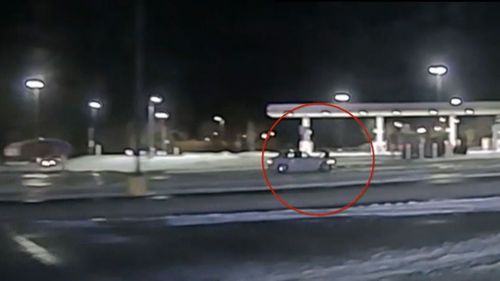 Fast food restaurant employee Kayla Sherman can be seen clinging to the bonnet of the car.