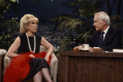 Despite calling <i>The Tonight Show</I> host Johnny Carson a mentor, the pair had a falling out over their competing late night shows in the late '80s. <br/><br/>Carson felt blindsided by Joan's rise to fame and the pair never spoke again. <br/><br/>Source: Getty