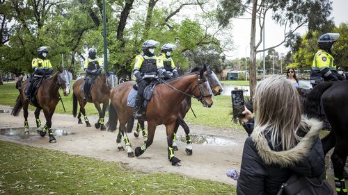 a small protest in Melbourne's Princes Park.